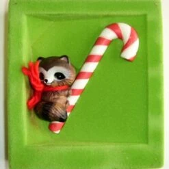 1981 Ambassador Raccoon On Candy Cane - RARE! - DB