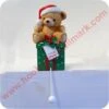 Teddy Bear With Santa Cap On Gift - Stocking Hanger -Hallmark MAGIC Ornaments Shop xsh6423